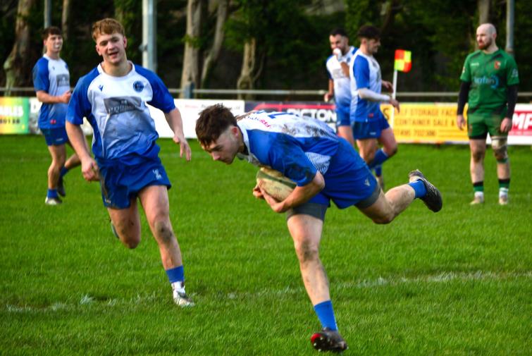 A cracking try for the bustling Blues. Picture William John